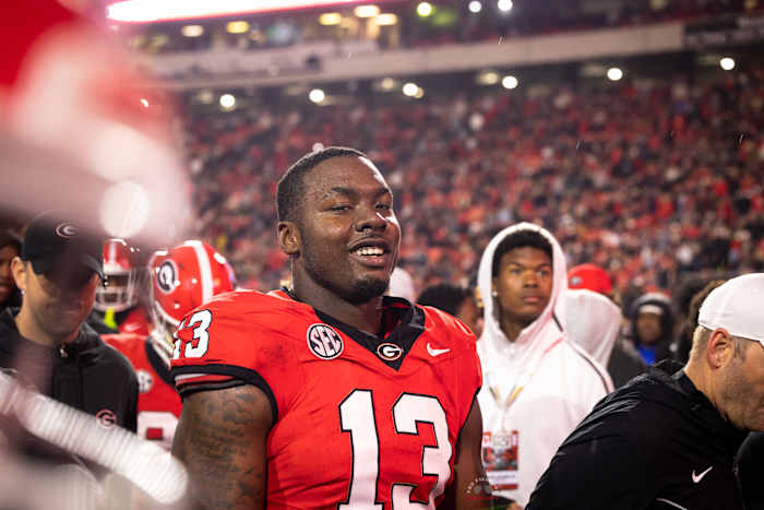 Georgia DE Mykel Williams (13) walks off the field to celebrate the Bullogs' 52-17 victory over Ole Miss, Nov. 11, 2023. (Brooks Austin / Dawgs Daily).